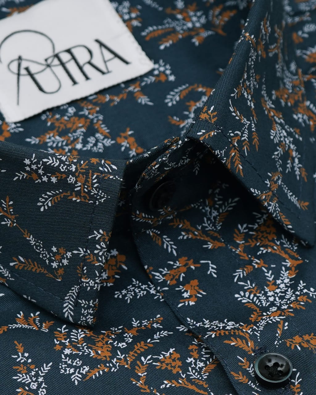 Blue Shirt with Floral Print and Orange Accent